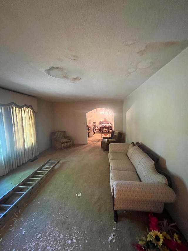 living room with a textured ceiling