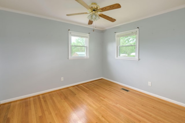 107 Hillis St, Mcminnville, TN 37110 - empty room with baseboards, visible vents, light wood finished floors, and a wealth of natural light