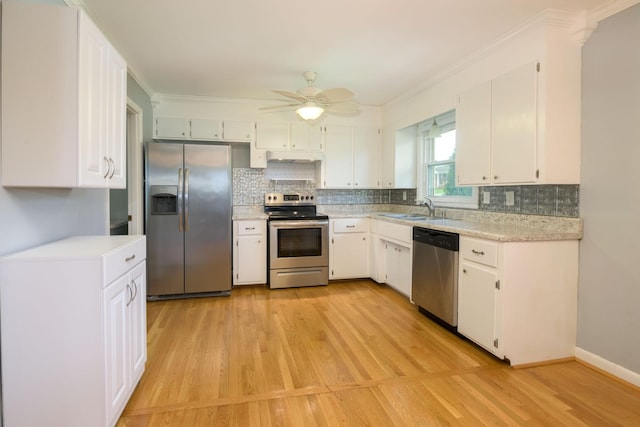 107 Hillis St, Mcminnville, TN 37110 - kitchen with light countertops, stainless steel appliances, and a sink