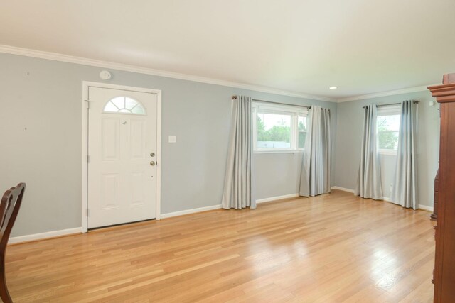 107 Hillis St, Mcminnville, TN 37110 - entryway featuring baseboards, light wood-style floors, and crown molding