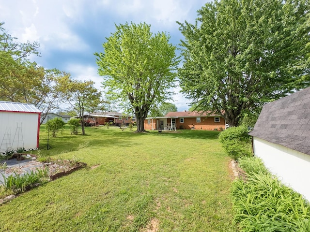 107 Hillis St, Mcminnville, TN 37110 - view of yard featuring an outbuilding