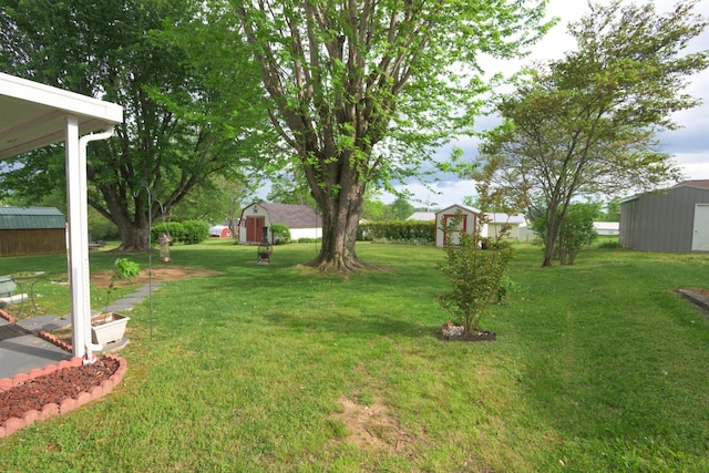 107 Hillis St, Mcminnville, TN 37110 - view of yard with an outbuilding and a storage shed