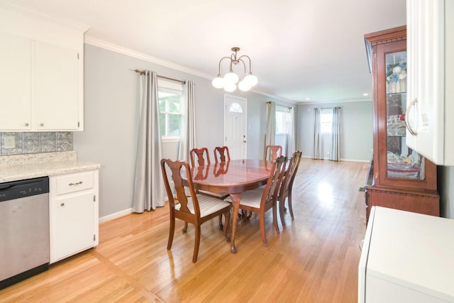 107 Hillis St, Mcminnville, TN 37110 - dining room featuring a wealth of natural light, crown molding, and light wood-style flooring