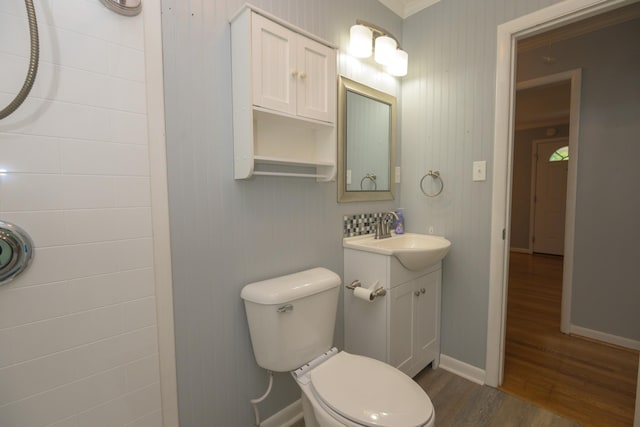 107 Hillis St, Mcminnville, TN 37110 - bathroom featuring toilet, vanity, wood finished floors, and baseboards