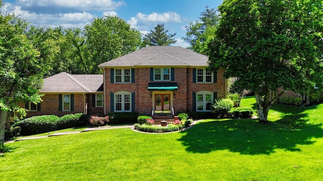 5712 Spring House Way, Brentwood, TN 37027 - georgian-style home featuring french doors, brick siding, and a front lawn