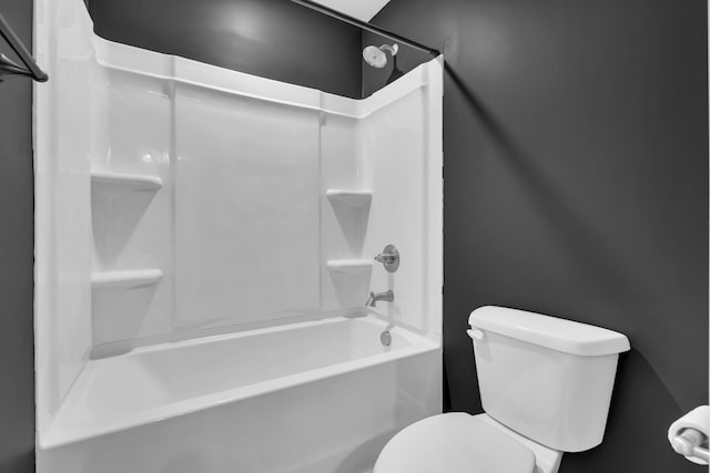 bathroom with toilet and shower / bathtub combination