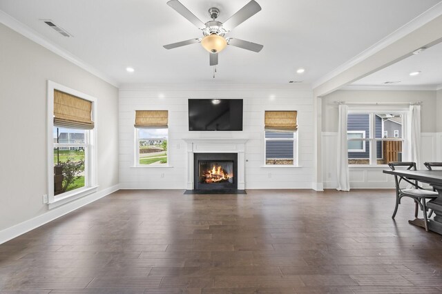 1239 Proprietors Pl, Murfreesboro, TN 37128 - unfurnished living room with dark wood-type flooring, a fireplace with flush hearth, visible vents, and crown molding