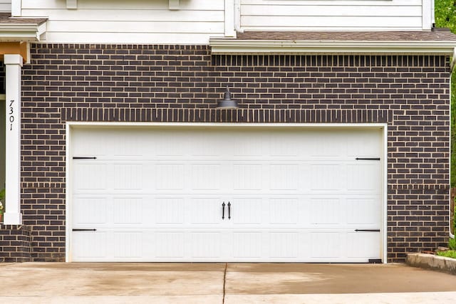 garage with driveway