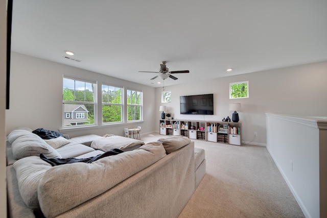 living area with visible vents, a ceiling fan, carpet floors, and recessed lighting
