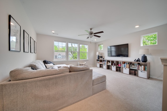 living room featuring recessed lighting, a ceiling fan, carpet flooring, and plenty of natural light