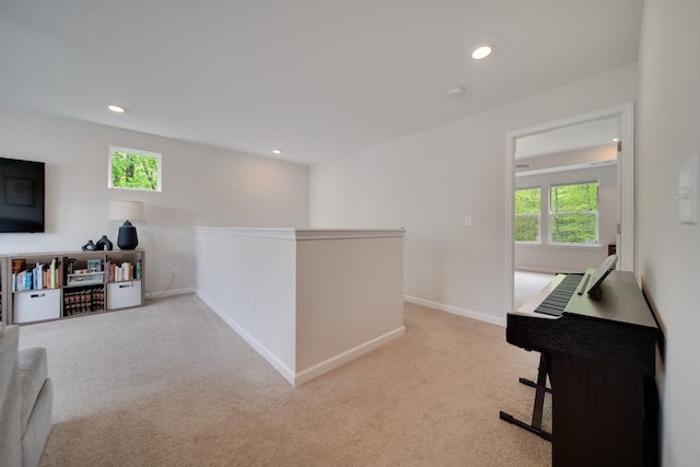 interior space with recessed lighting and light colored carpet