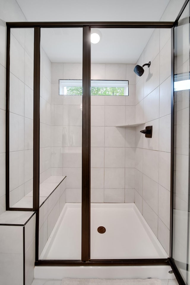 bathroom with a stall shower