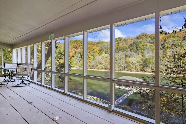 unfurnished sunroom featuring a healthy amount of sunlight