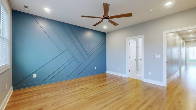 6412B Edsel Dr, Nashville, TN 37209 - unfurnished room featuring a decorative wall, a ceiling fan, wood finished floors, attic access, and baseboards
