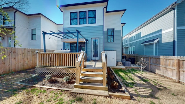 6412B Edsel Dr, Nashville, TN 37209 - back of property featuring a wooden deck, a fenced backyard, cooling unit, and a pergola