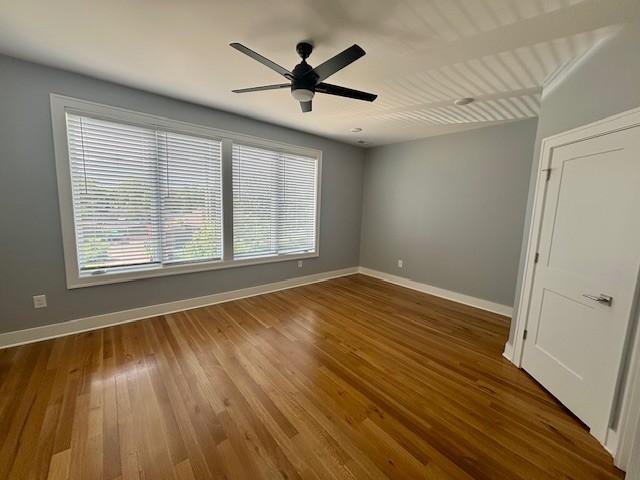 6412B Edsel Dr, Nashville, TN 37209 - unfurnished room featuring healthy amount of natural light, baseboards, and wood finished floors