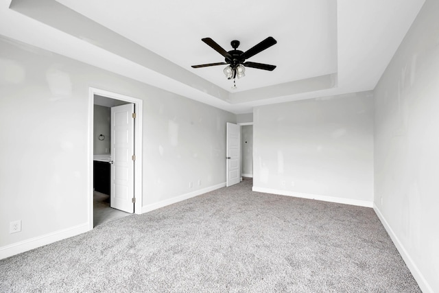 350 Galway Dr, Clarksville, TN 37042 - unfurnished bedroom featuring carpet, baseboards, a raised ceiling, ensuite bathroom, and ceiling fan