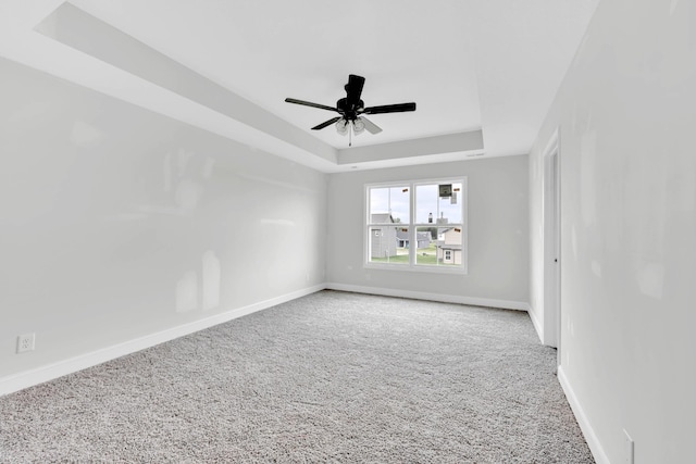 350 Galway Dr, Clarksville, TN 37042 - carpeted spare room with a raised ceiling, baseboards, and a ceiling fan