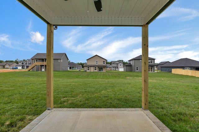 350 Galway Dr, Clarksville, TN 37042 - view of green lawn featuring a residential view, ceiling fan, and a patio