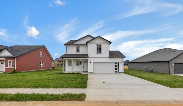 350 Galway Dr, Clarksville, TN 37042 - modern farmhouse with concrete driveway, a front lawn, a porch, central AC unit, and a garage