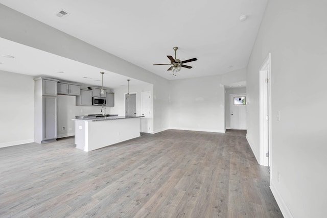 358 Galway Dr, Clarksville, TN 37042 - unfurnished living room featuring ceiling fan and wood finished floors