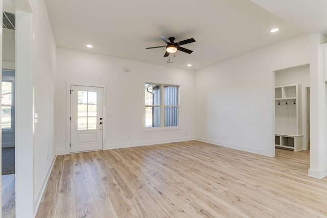 unfurnished living room featuring light wood-type flooring, baseboards, recessed lighting, and ceiling fan