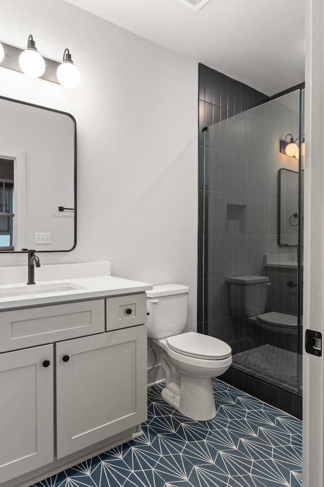 430 Mercomatic Dr, Nashville, TN 37209 - bathroom featuring vanity, toilet, and a stall shower