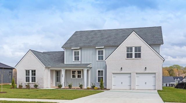7408 Black Fox Dr, Fairview, TN 37062 - modern farmhouse with board and batten siding, an attached garage, brick siding, and concrete driveway
