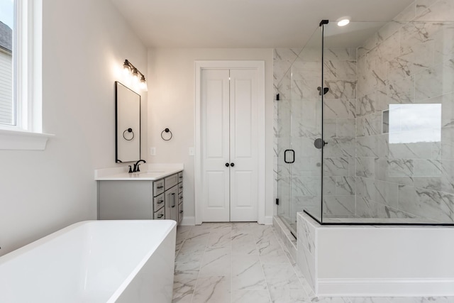 7408 Black Fox Dr, Fairview, TN 37062 - bathroom featuring a freestanding tub, marble finish floor, vanity, and a stall shower