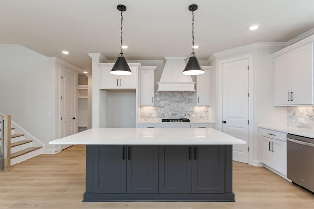 7408 Black Fox Dr, Fairview, TN 37062 - kitchen featuring white cabinets, gas stovetop, stainless steel dishwasher, and custom range hood