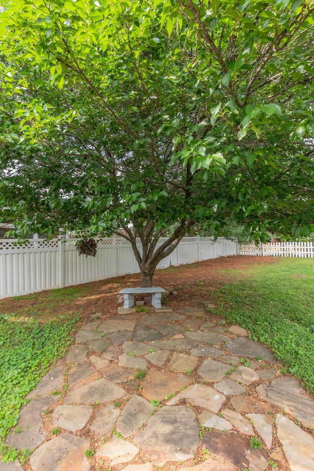 view of patio / terrace featuring fence