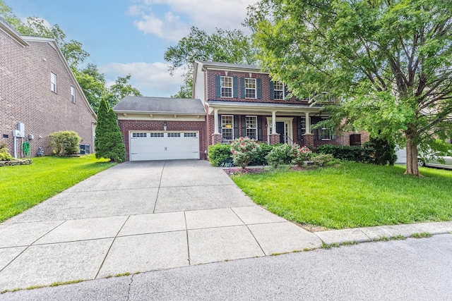 view of front of home with brick siding, a porch, an attached garage, concrete driveway, and a front lawn