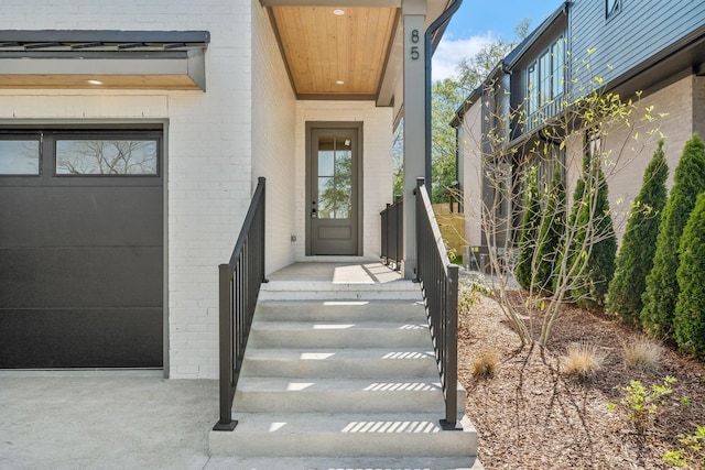 entrance to property with brick siding