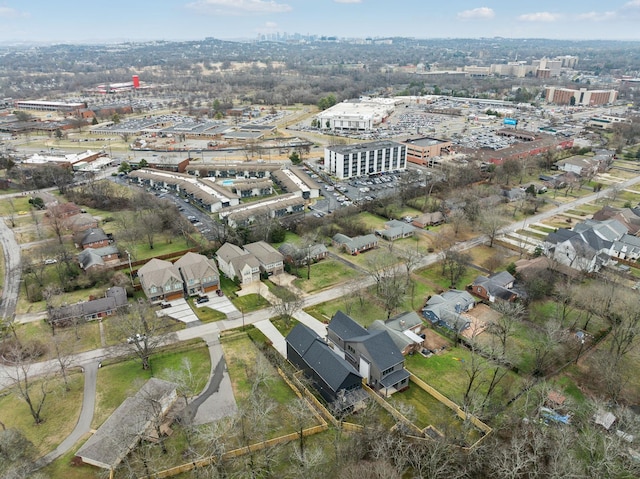 birds eye view of property featuring a city view