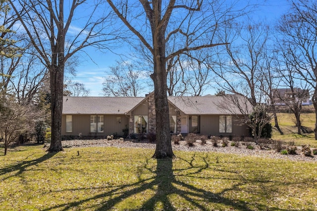 8309 Alamo Rd, Brentwood, TN 37027 - view of front of house featuring a shingled roof and a front yard