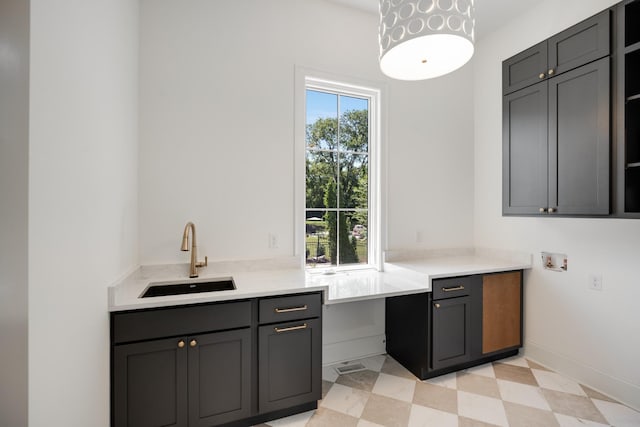 2811 Tyne Blvd, Nashville, TN 37215 - interior space with light floors, baseboards, hanging light fixtures, and a sink