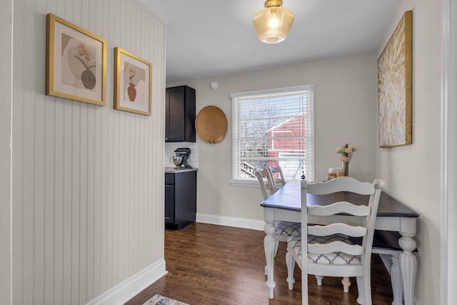 office area featuring dark wood finished floors and baseboards