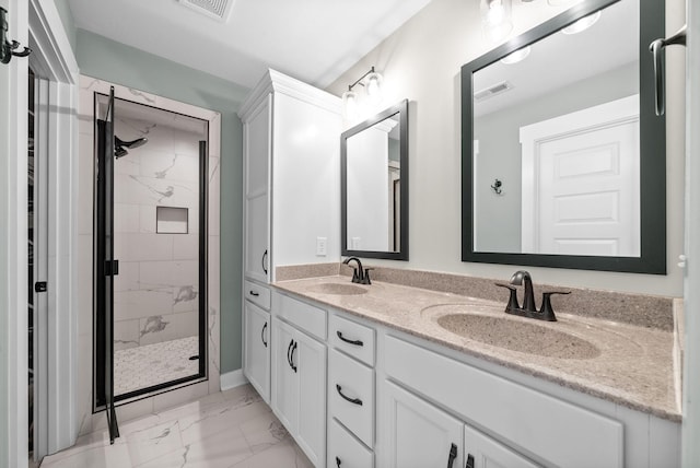 237 Wade Hampton Ln, Clarksville, TN 37040 - bathroom with visible vents, a marble finish shower, a sink, and marble finish floor
