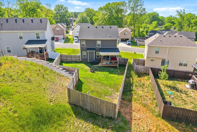 237 Wade Hampton Ln, Clarksville, TN 37040 - back of house with a residential view, a fenced backyard, and a wooden deck
