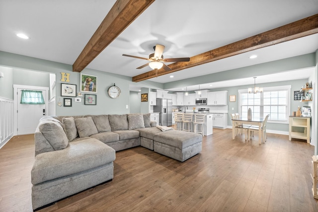 237 Wade Hampton Ln, Clarksville, TN 37040 - living area with recessed lighting, ceiling fan with notable chandelier, hardwood / wood-style flooring, and beam ceiling