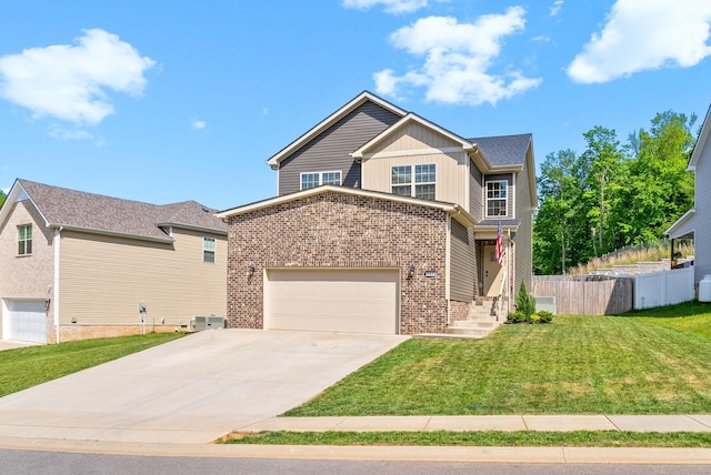 237 Wade Hampton Ln, Clarksville, TN 37040 - view of front facade with a garage, brick siding, fence, a front lawn, and concrete driveway
