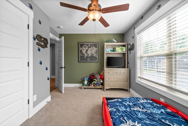 237 Wade Hampton Ln, Clarksville, TN 37040 - carpeted bedroom with baseboards and ceiling fan