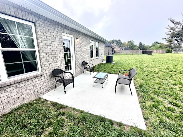 view of patio / terrace with fence and cooling unit
