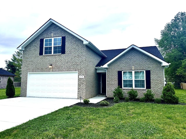 traditional-style home featuring an attached garage, driveway, brick siding, and a front yard