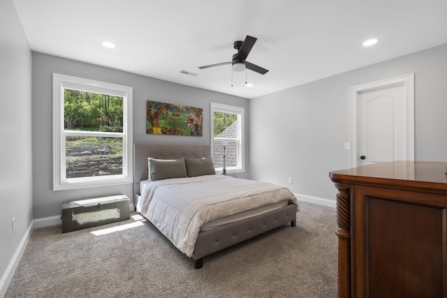 carpeted bedroom with baseboards, visible vents, ceiling fan, and recessed lighting