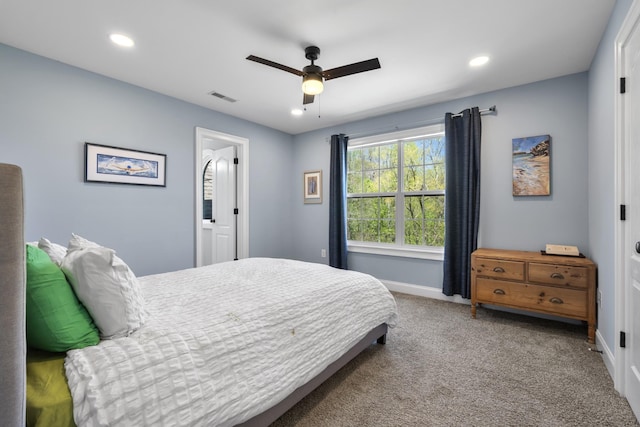 bedroom with baseboards, visible vents, carpet, and recessed lighting