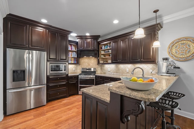 kitchen featuring appliances with stainless steel finishes, open shelves, a peninsula, ornamental molding, and dark brown cabinets