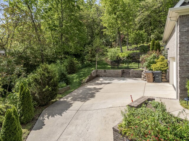 view of patio featuring fence