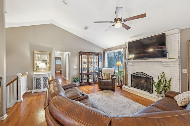 843 Percy Warner Blvd, Nashville, TN 37205 - living area featuring lofted ceiling, a ceiling fan, a fireplace, hardwood / wood-style floors, and baseboards