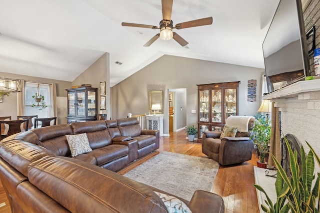 843 Percy Warner Blvd, Nashville, TN 37205 - living area with wood-type flooring, ceiling fan, lofted ceiling, a fireplace, and baseboards
